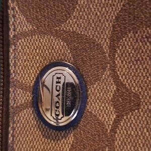 Coach Wristlet; Brown with Med Blue Piping & Strap